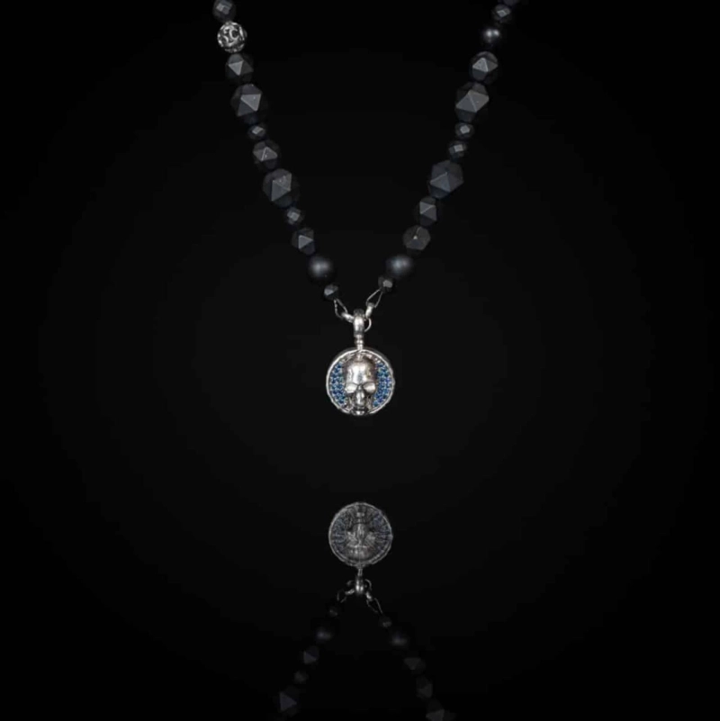 Mastering the Art of Subtle Rebellion: The Black Skull Necklace from Compass Jewelry