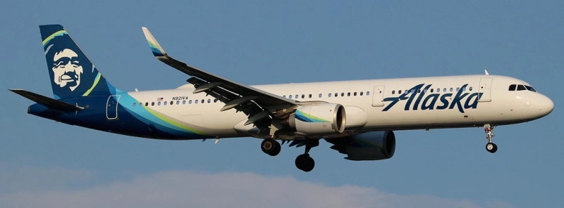 How to upgrade to first class on Alaska Airlines?