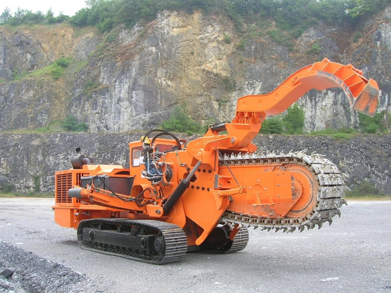With Trencher, Soil And Rocks Are Broken, And Debris Is Removed