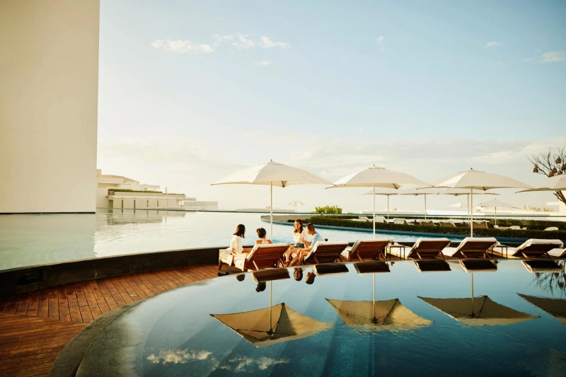 How do luxury hotels maintain exclusivity and privacy?