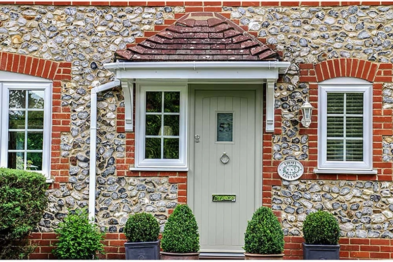 What are cottage-style windows made of?