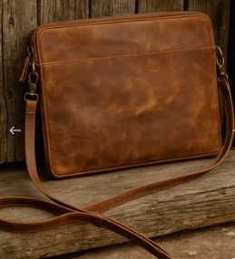 How do I clean and maintain a Leather Laptop Sleeve?