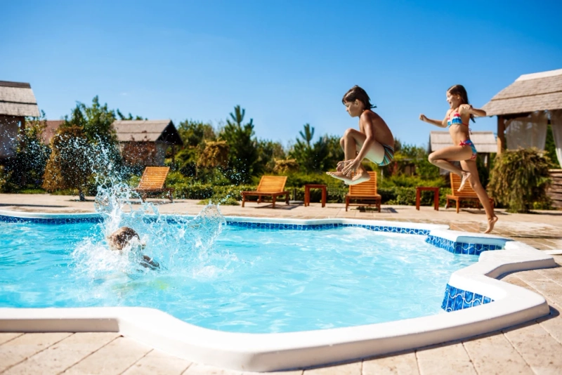 10 Stunning In-Ground Pool Designs by Top Construction Companies in 2025