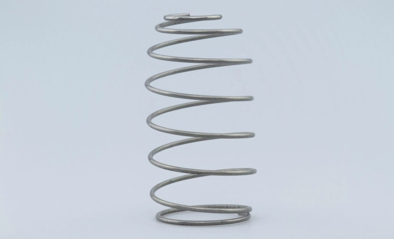 Springs for winding watches and batteries