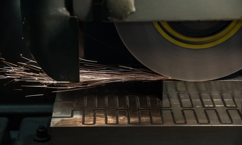 Why are CNC machines necessary for manufacturing businesses?