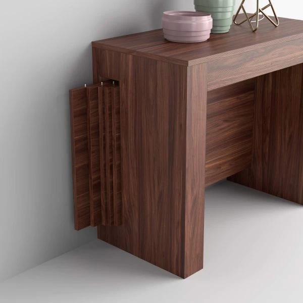 La mesa que no ocupa espacio y puede ser un escritorio o una mesa de comedor