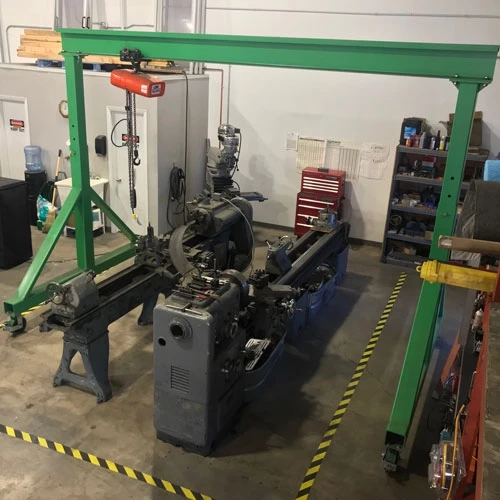 What kind of specialists work in the precision mechanics workshop?