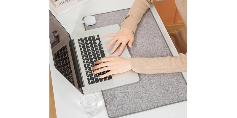 During the winter, These heated desk mats will keep your work-from-home setup warm