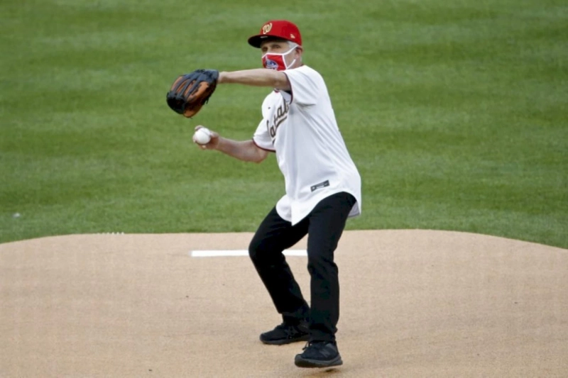 Fauci gets personalized baseball card after first pitch