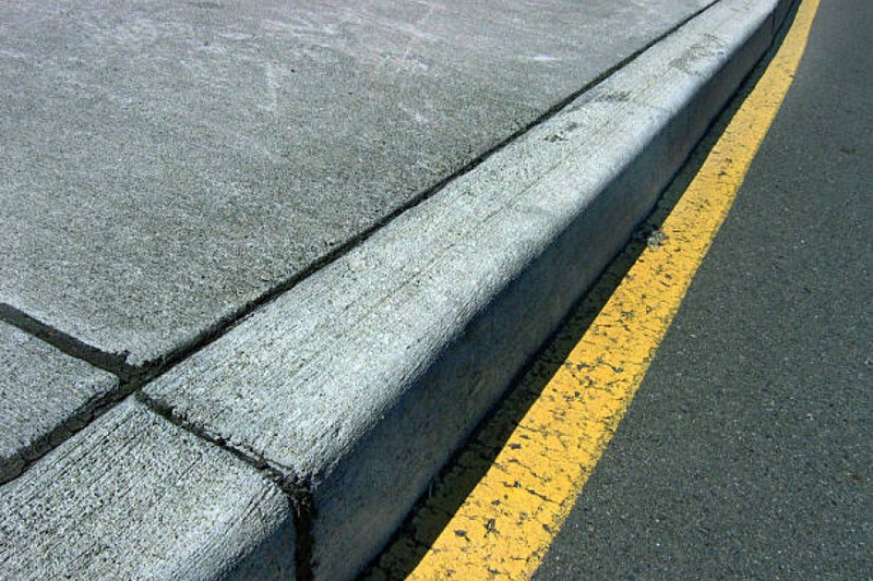Understanding the Sidewalk Curb Damage in Queens