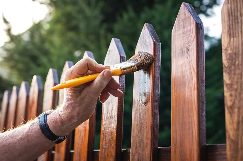 Signs You Need To Paint Your Fence