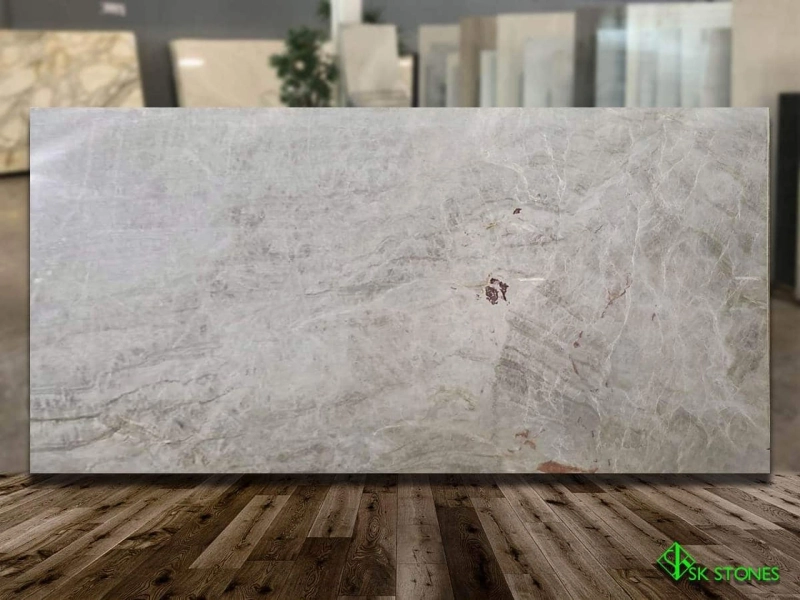 How do I clean and maintain leathered finish quartzite slabs?