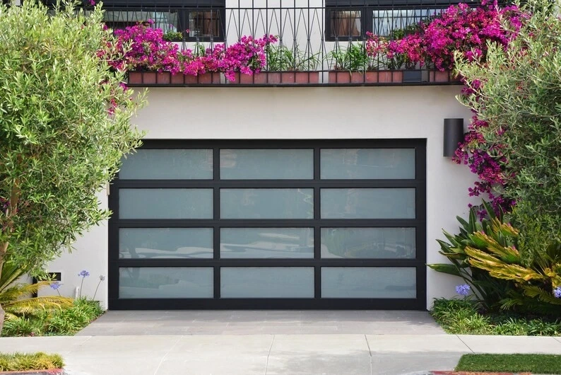 Bring Ultimate Convenience of Tesla HomeLink to your Garage Door with Us