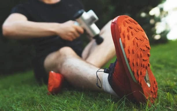 How Runners Can Use a Massage Gun for Movement Prep