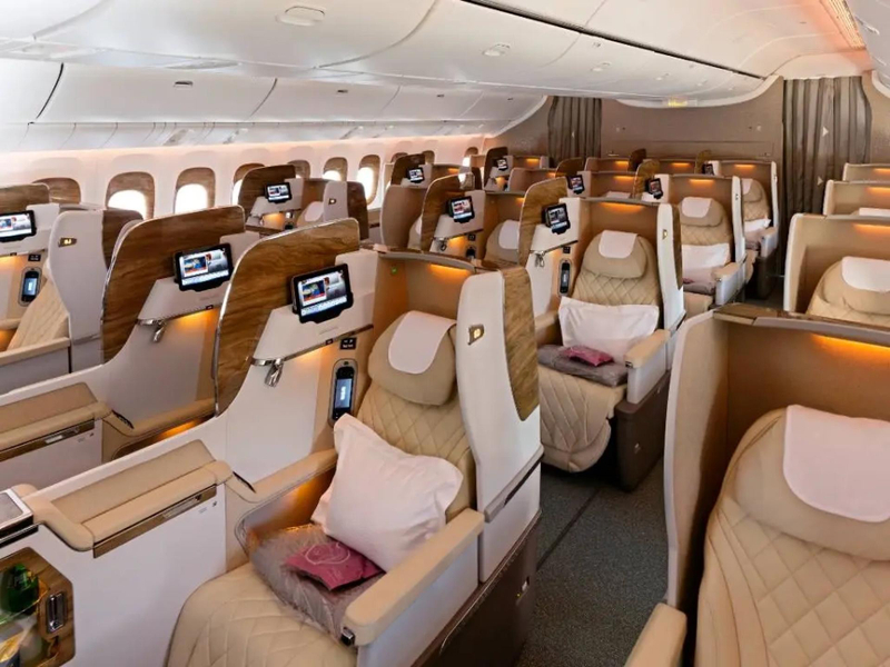 Can I upgrade from economy to business in Emirates?