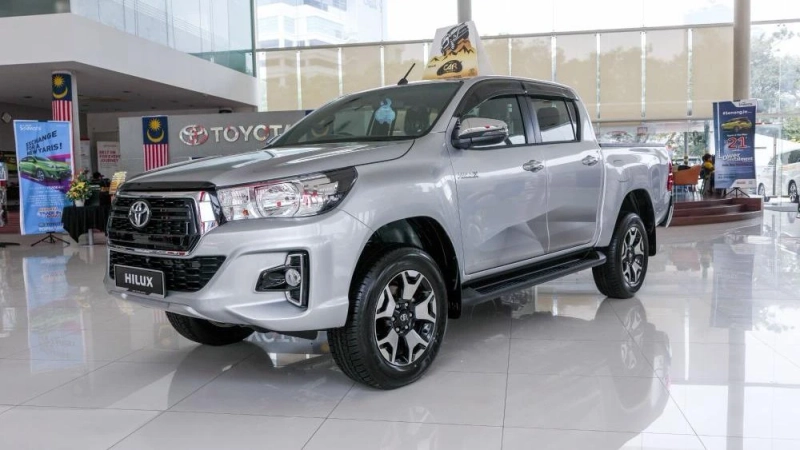 Pergi ke Malaysia untuk menguji dan membandingkan jarak antara Toyota Hilux 2.8L dan Mitsubishi Triton 2.4L