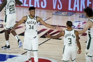 NBA roundup: Bucks pound Magic, even series