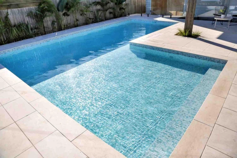 Top Trending Designs in Swimming Pool Tiles: Embracing Natural Stone