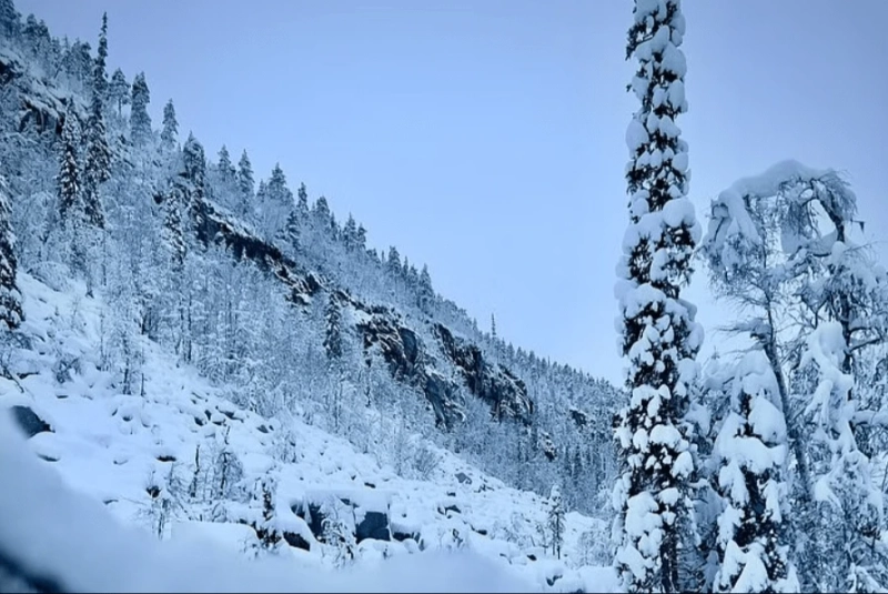 Explore the Majestic Frozen Waterfall Finland Tour with Unforgettable Fun