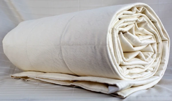 Protect Your Bed the Natural Way with a Washable Wool Mattress Pad