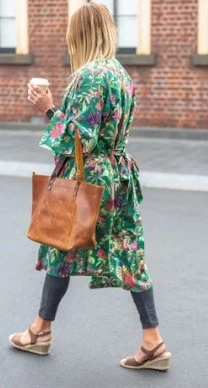 What is the difference between full-grain leather and genuine leather tote bags?