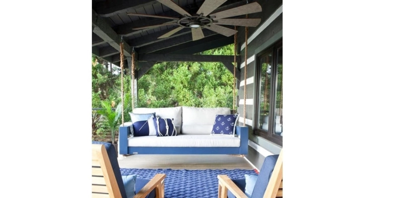 How Can a Porch Bed, Pops of Colors, Rugs, and Ambient Lighting All Spruce Up Your Outdoor Living Space