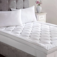 Embracing Comfort and Sustainability: The Unrivaled Benefits of a Wool Mattress Topper