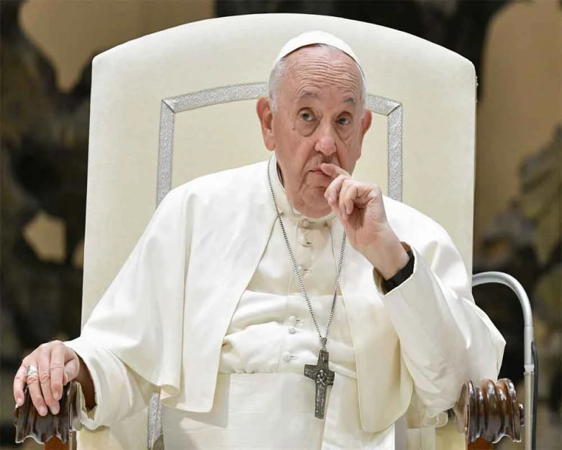 Pope Francis baptizes babies one by one in an annual ceremony at the Sistine Chapel