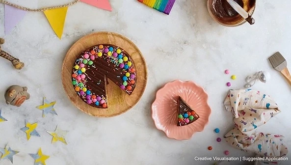 The process of baking a cake with gems in microwave