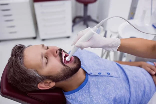 The Invisible Film on Your Teeth: How Airflow Teeth Cleaning Disrupts Biofilm Before It Becomes Gum Disease