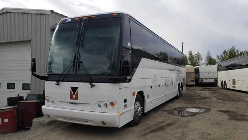 Navigating Bus Schedules with the Assistance of Charter Bus Company Employees
